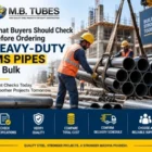 Workers handling bulk MS pipes from a Heavy Duty MS Pipe Manufacturer in Madhya Pradesh for a construction project